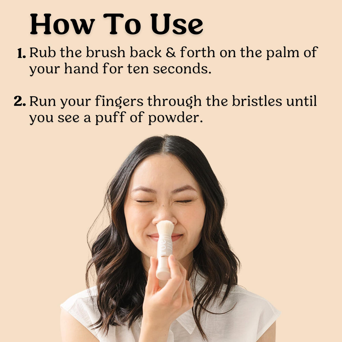 Roe Wellness SPF 50 Powder Sunscreen in a hand for application