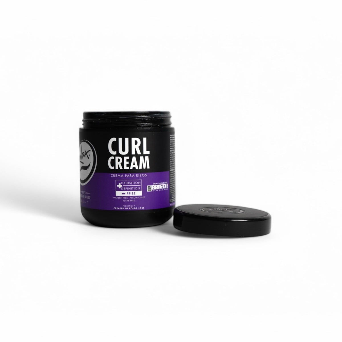 Rolda Curl Cream displayed with grooming tools