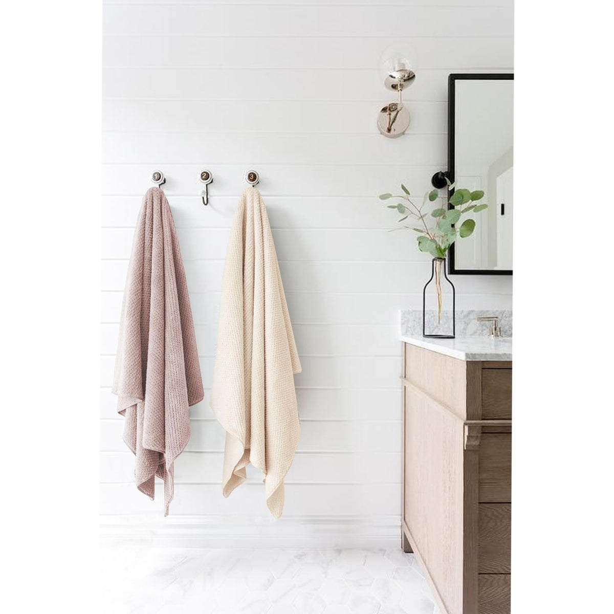 ROLSHOL hair towel wrap in pink hanging on a towel rack