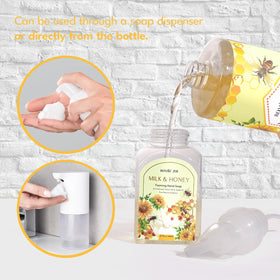 ROMIIE ZOI Foaming Hand Soap refill bottles on a wooden shelf
