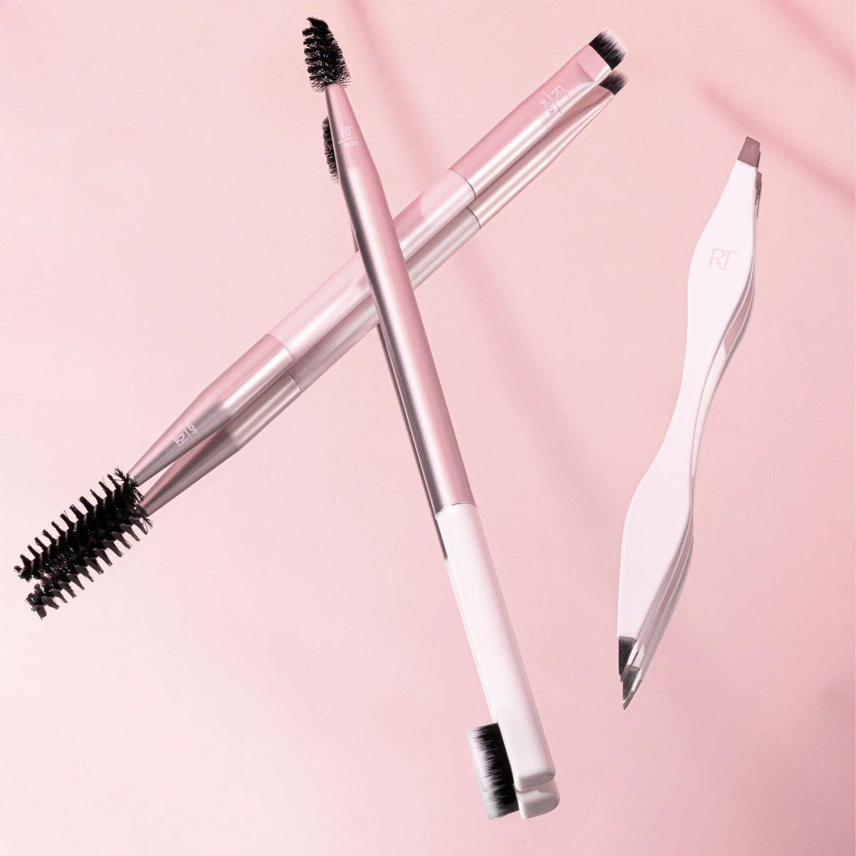 RT Brow Spoolie and Flat Brow Brush in use
