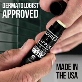 RUGGED & DAPPER Lip Balm tube close-up showing organic ingredients