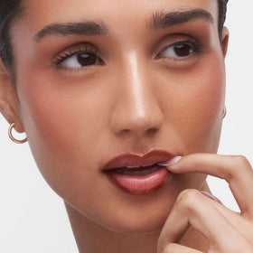 Sacheu Lip Liner STAY-N Peel Off Lip Stain on a makeup vanity