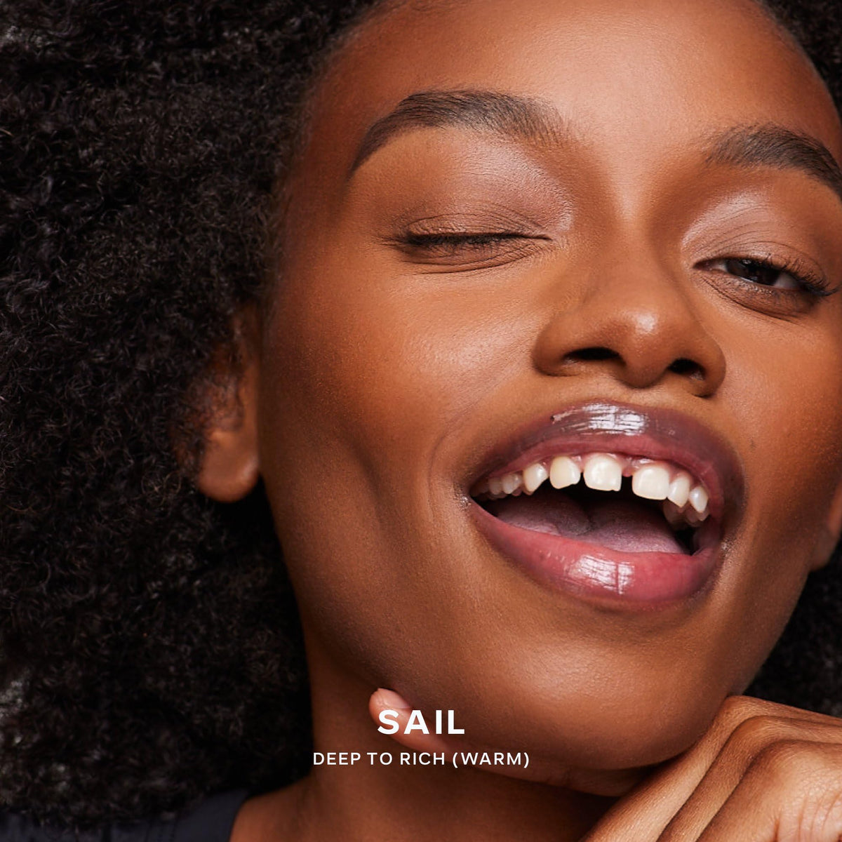 Saie Dew Bronze in natural light on model's cheek