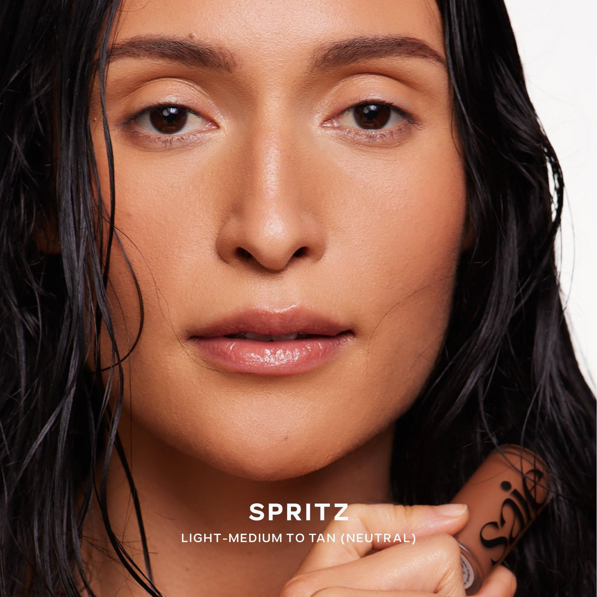 Saie Dew Bronze Liquid Bronzer Stick in natural light