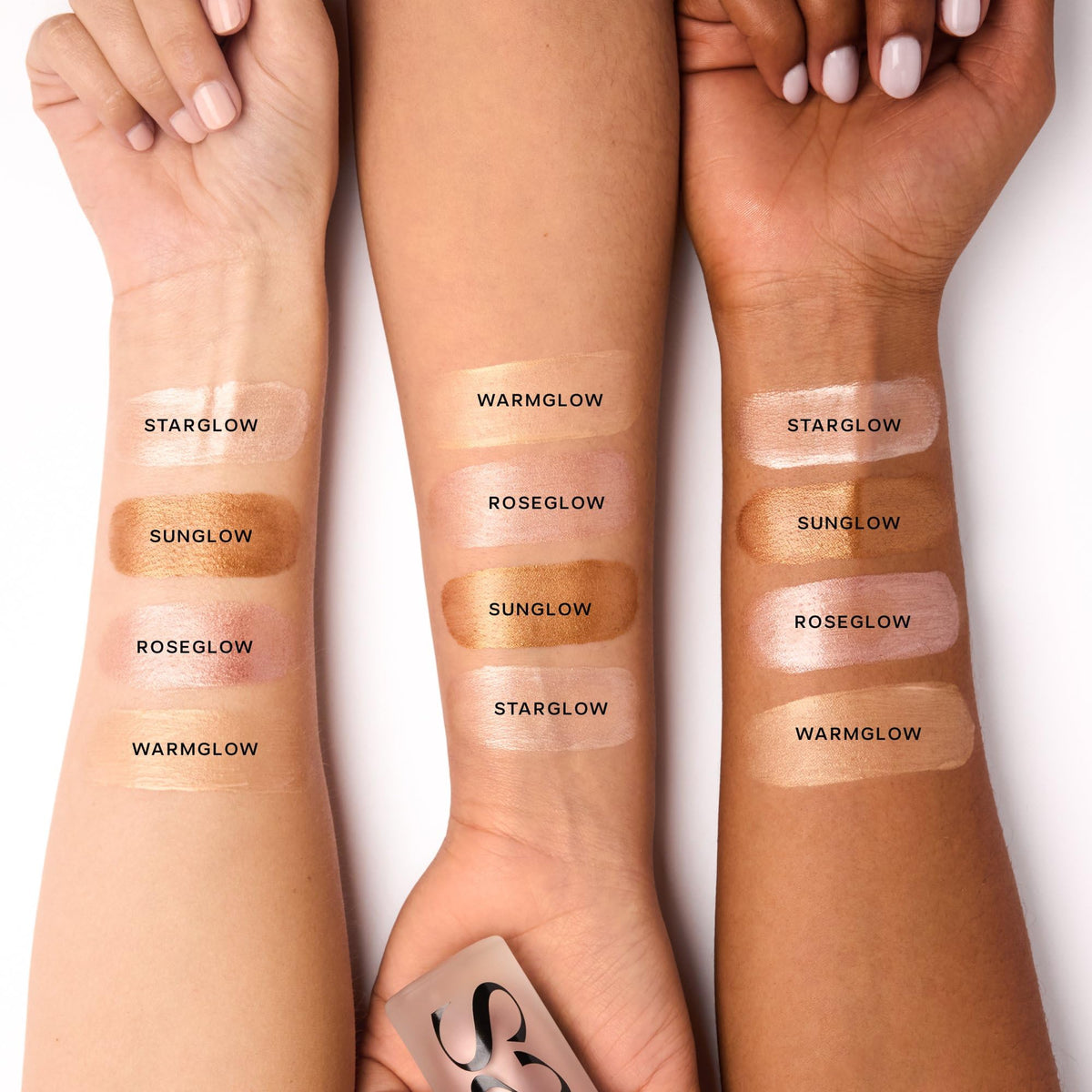 Saie Mini Glowy Super Gel Primer with foundation on a makeup table