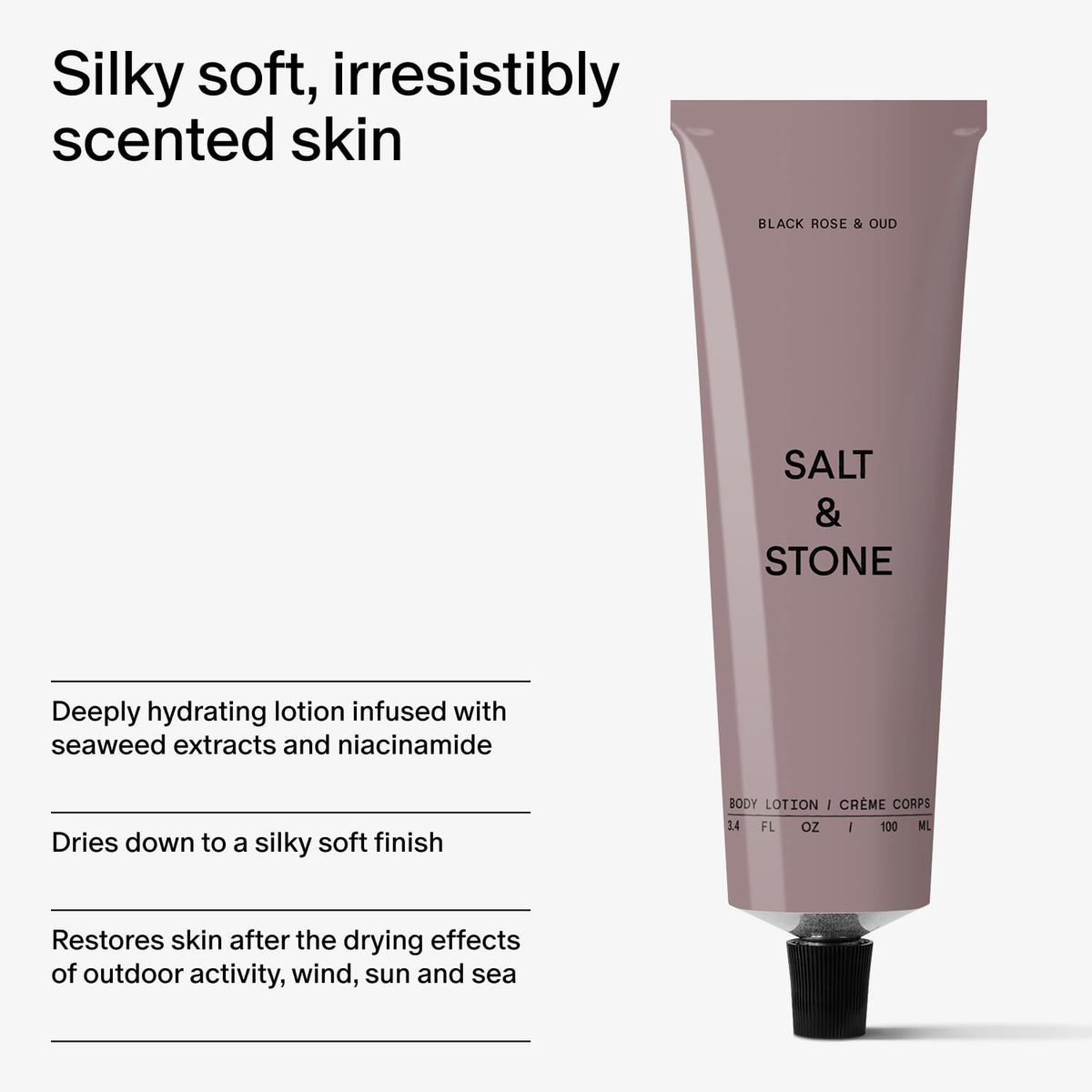 Salt & Stone Body Lotion displayed with black roses