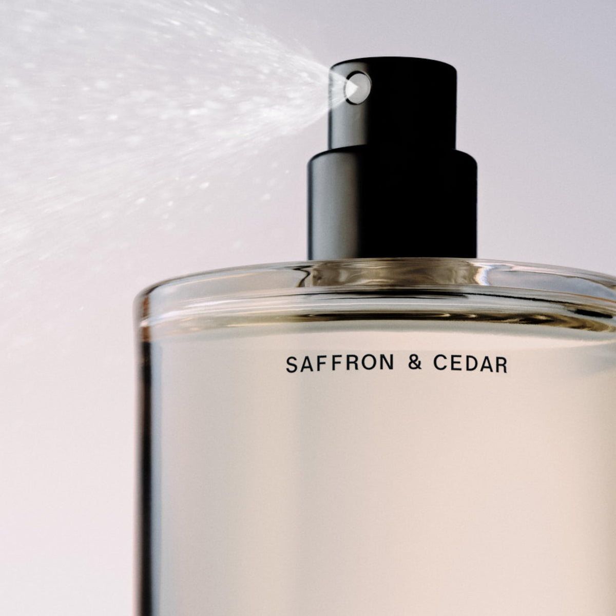 Salt & Stone Hair & Body Mist Saffron & Cedar with natural background