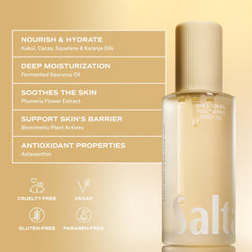 Saltair Body Oil displayed with a soothing candle