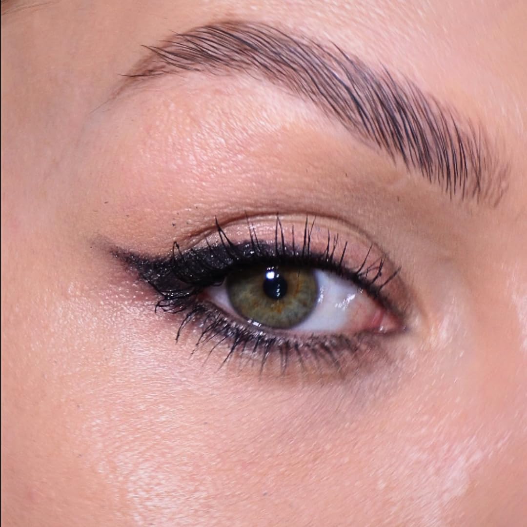 Sandstone Scandinavia Eyeliner Pencil displayed with a makeup brush