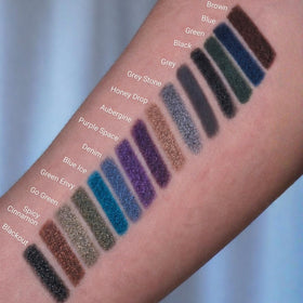 Sandstone Scandinavia Waterproof Eyeliner Pencil Green swatch on skin