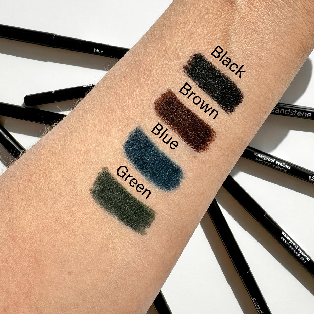 Sandstone Scandinavia Waterproof Eyeliner Pencil in a makeup bag