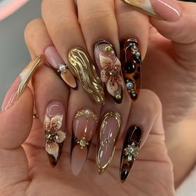 SEENEEY Almond Press On Nails front view with gold charm designs