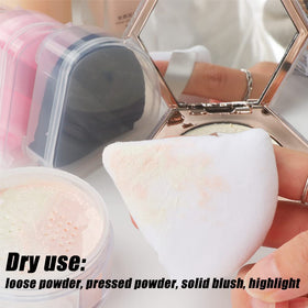 Set of Ocim Triangle Powder Puffs displayed on a vanity