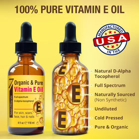 Seven Minerals Vitamin E Oil beside fresh flowers