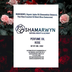 shamarwyn Rose Perfume Oil 10ml roll-on bottle with floral background