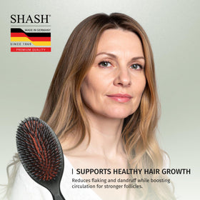 SHASH Boar Bristle Hair Brush demonstrating detangling on hair