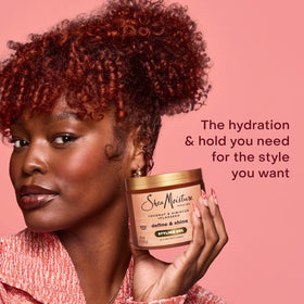 Shea Moisture Coconut & Hibiscus Styling Gel with ingredients on display