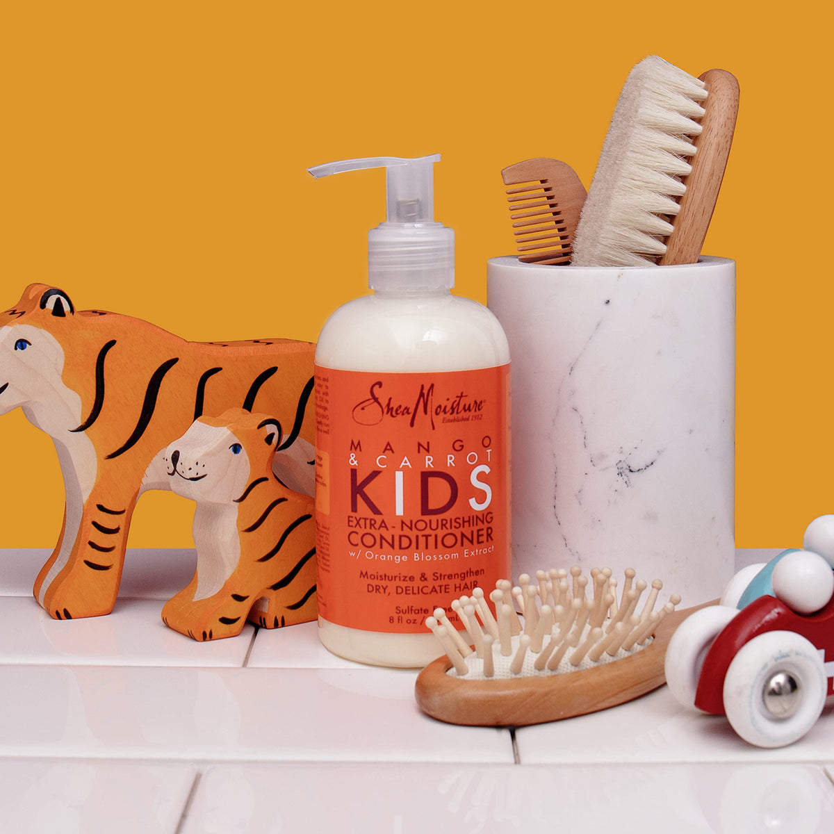Shea Moisture Kids Conditioner Mango & Carrot in a bathroom setting