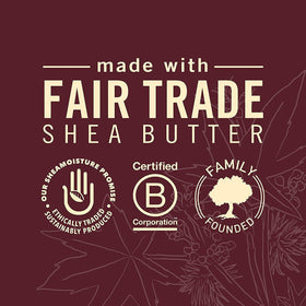 Shea Moisture shampoo and conditioner set displayed with towels