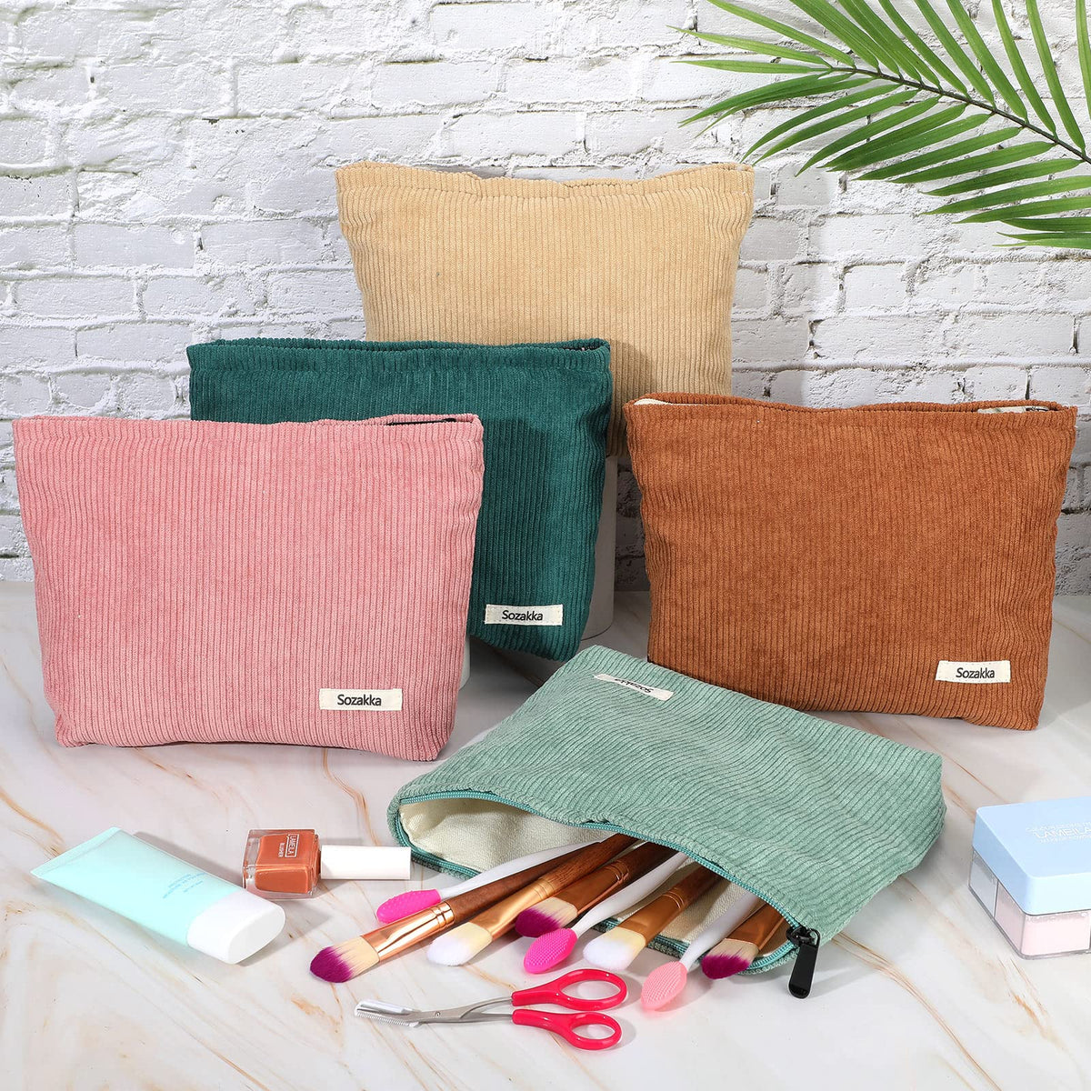 Sherr makeup bags displayed in a stylish setting