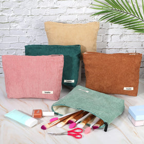 Sherr makeup bags displayed in a stylish setting
