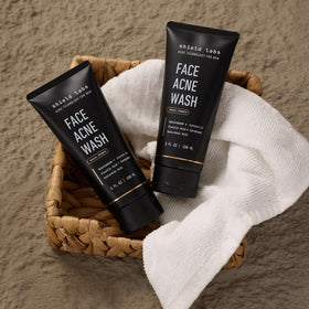Shield Face Acne Wash for Men 5.1 oz on bathroom counter