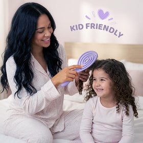 SHINLEA Detangle Hair Brush displayed with other styling tools