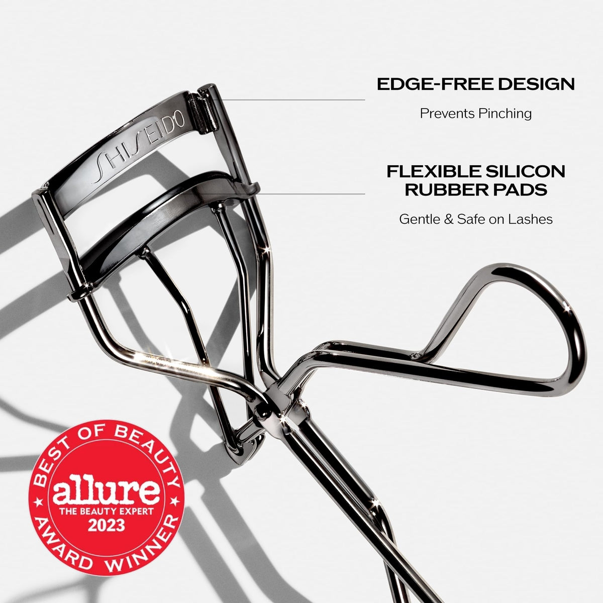 Shiseido Eyelash Curler in use on lashes