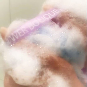 Shower Bouquet Loofah Bath Sponge XL in a bathroom setting