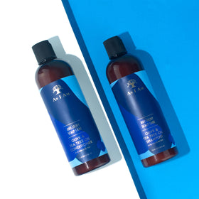 Side view of As I Am Dry & Itchy Scalp Care Shampoo bottle