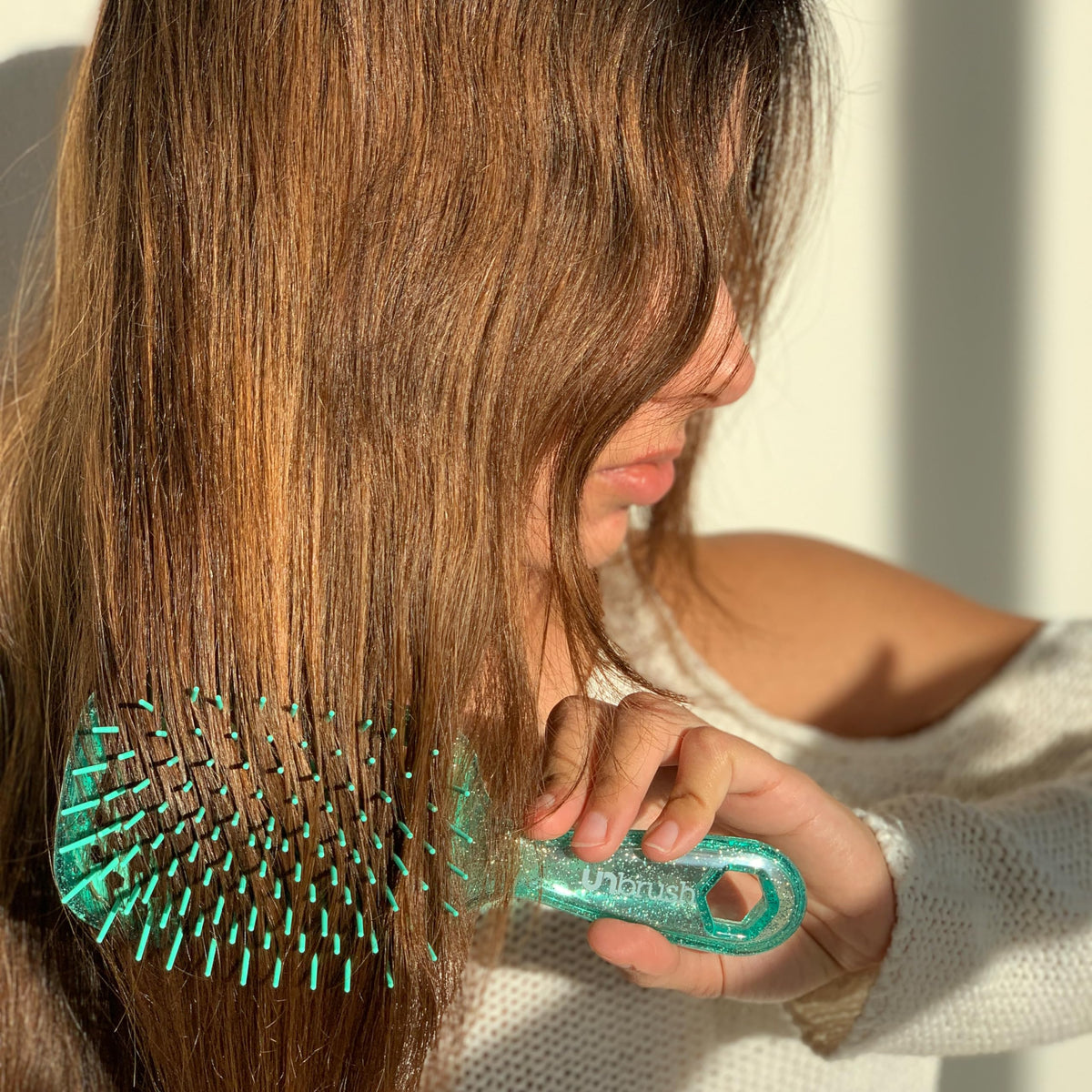 Side view of FHI Heat UNbrush showing DuoFlex Anti-Static Bristles