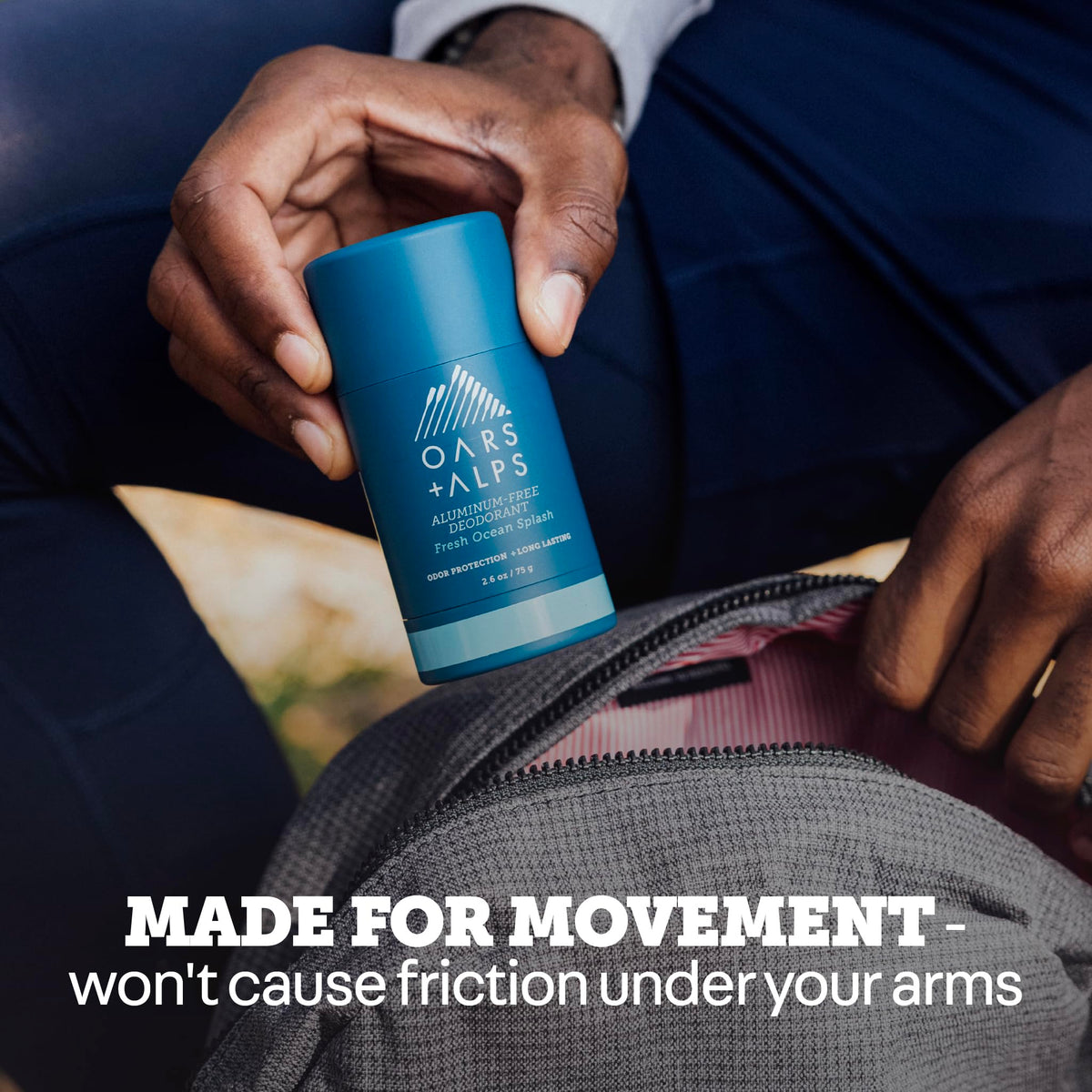 Side view of Oars + Alps Men's Deodorant in packaging