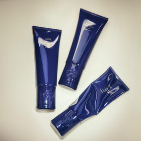Side view of ORIBE Supershine Moisturizing Styling Cream