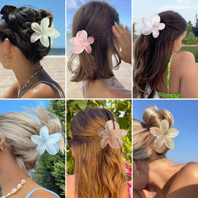 Sisiaipu Flower Hair Clips in a lifestyle setting on a beach