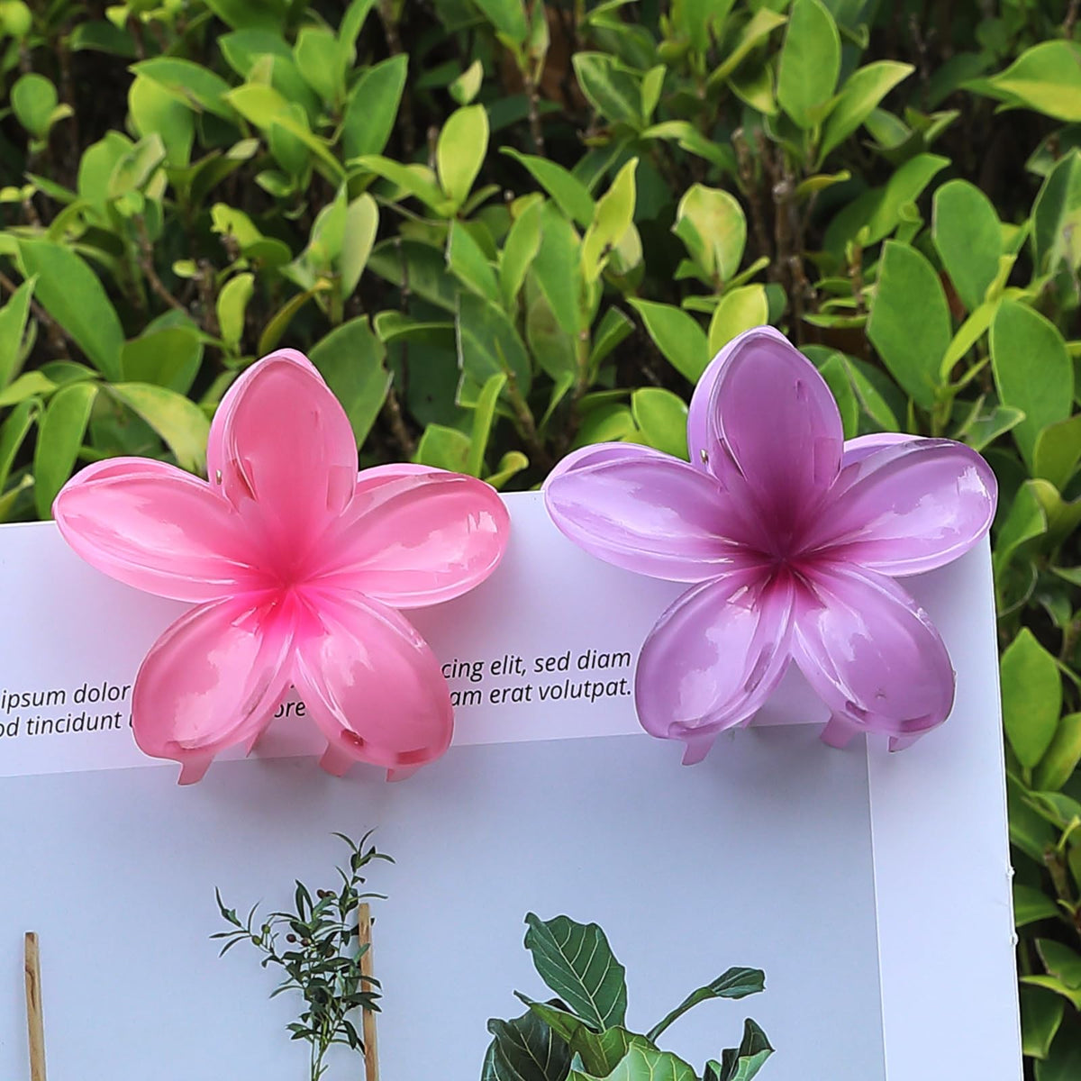 Sisiaipu Flower Hair Clips in Orange and Green with packaging