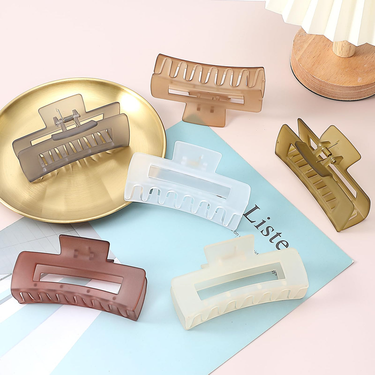 Sisiaipu hair claw clips in different colours on a vanity
