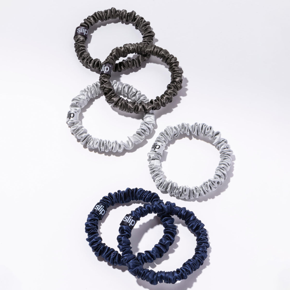 SLIP Midnight Silk Hair Ties arranged in a stylish manner