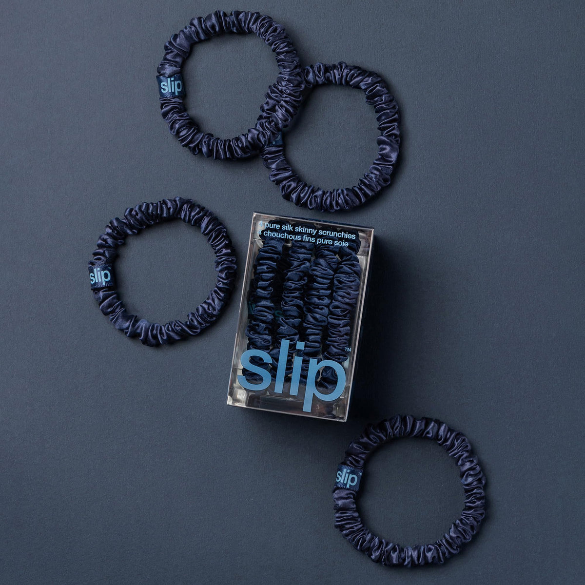 SLIP navy scrunchies close-up showing silk texture