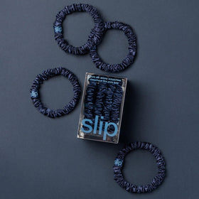 SLIP navy scrunchies close-up showing silk texture
