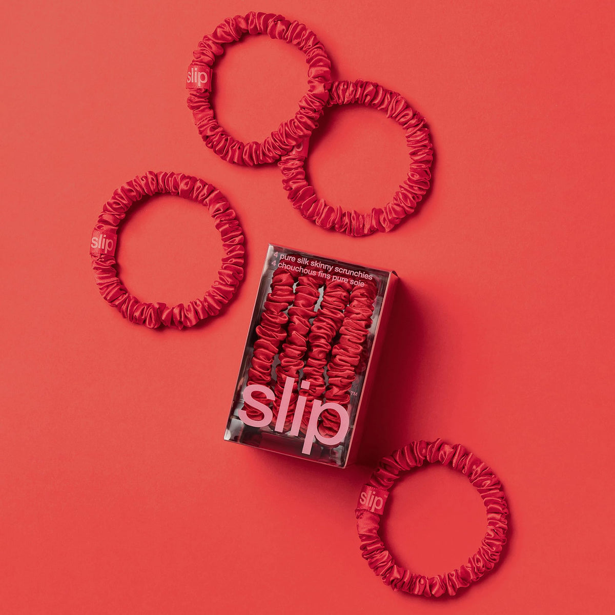 SLIP red silk scrunchies in a stylish hairstyle