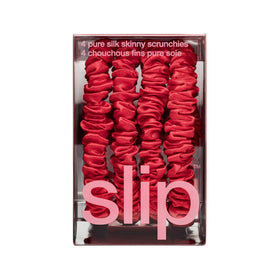 SLIP red silk scrunchies showing their gentle hold