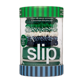 SLIP scrunchies displayed with hair styling tools