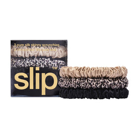 SLIP silk scrunchies displayed on a soft surface