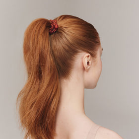 SLIP Silk Skinny Scrunchies displayed in elegant packaging