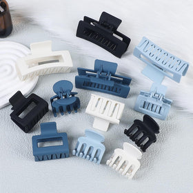 SMKSL hair claw clips in various styles on display