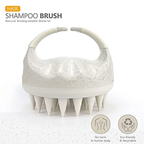 Sndyi scalp scrubber showing ergonomic handle design