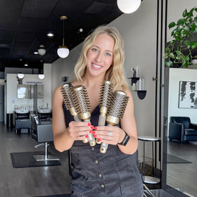 Sndyi Small Round Brush demonstrating blow drying technique