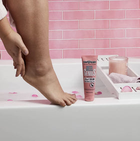 Soap & Glory foot cream being applied to feet