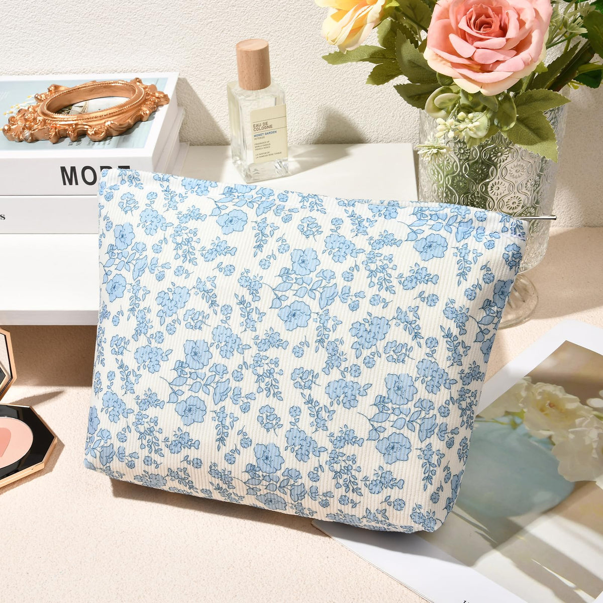 SOIDRAM Blue Floral Makeup Bags folded flat for storage